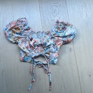 Crop top floral blouse with ribbon bow ties in the front